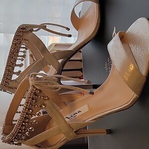 New w/o the tags Silverstone size 7'2. Elegance Italian high heels